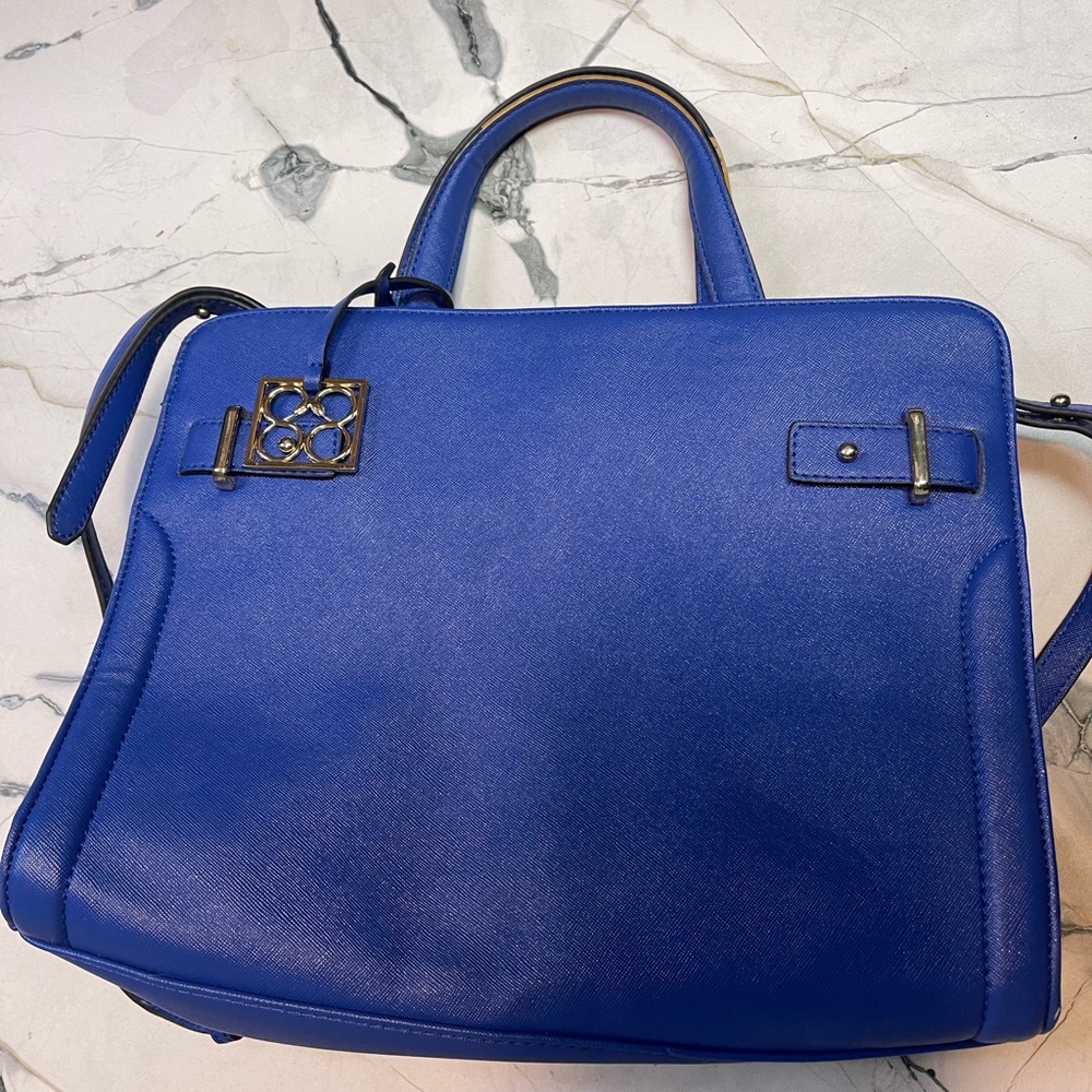 blue vegan leather handbag with gold hardware